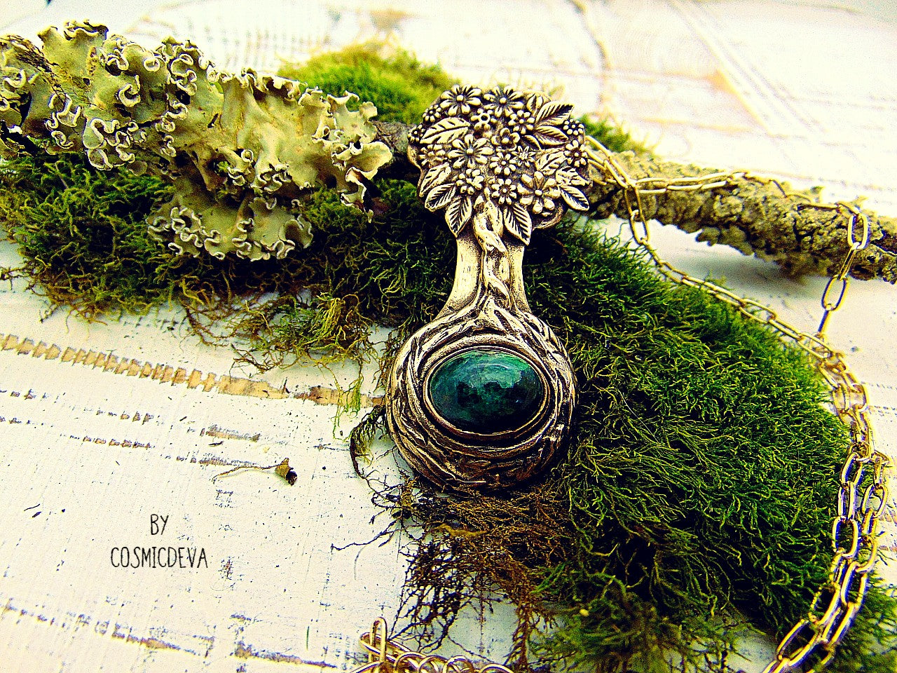 Express your love of life and nature with this intricately-crafted Tree of Life pendant necklace. Handcrafted from solid bronze with a beautiful emerald stone at its root, this unique piece of jewelry celebrates togetherness, growth, and individuality. Give yourself or a loved one the enduring gift of its timeless symbolism.