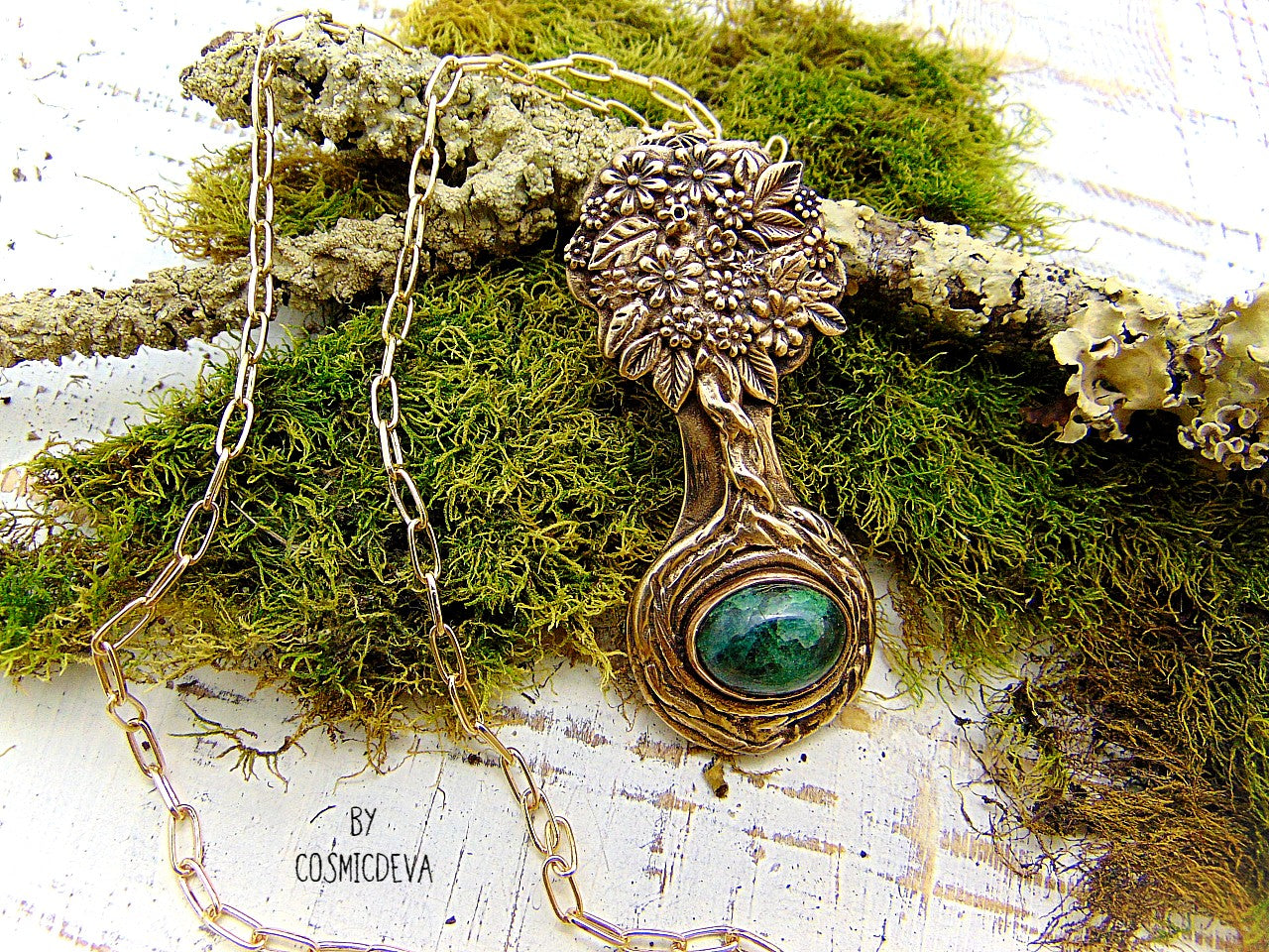Express your love of life and nature with this intricately-crafted Tree of Life pendant necklace. Handcrafted from solid bronze with a beautiful emerald stone at its root, this unique piece of jewelry celebrates togetherness, growth, and individuality. Give yourself or a loved one the enduring gift of its timeless symbolism.