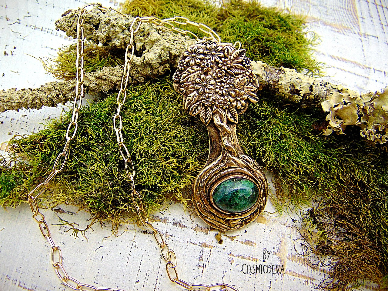 Express your love of life and nature with this intricately-crafted Tree of Life pendant necklace. Handcrafted from solid bronze with a beautiful emerald stone at its root, this unique piece of jewelry celebrates togetherness, growth, and individuality. Give yourself or a loved one the enduring gift of its timeless symbolism.