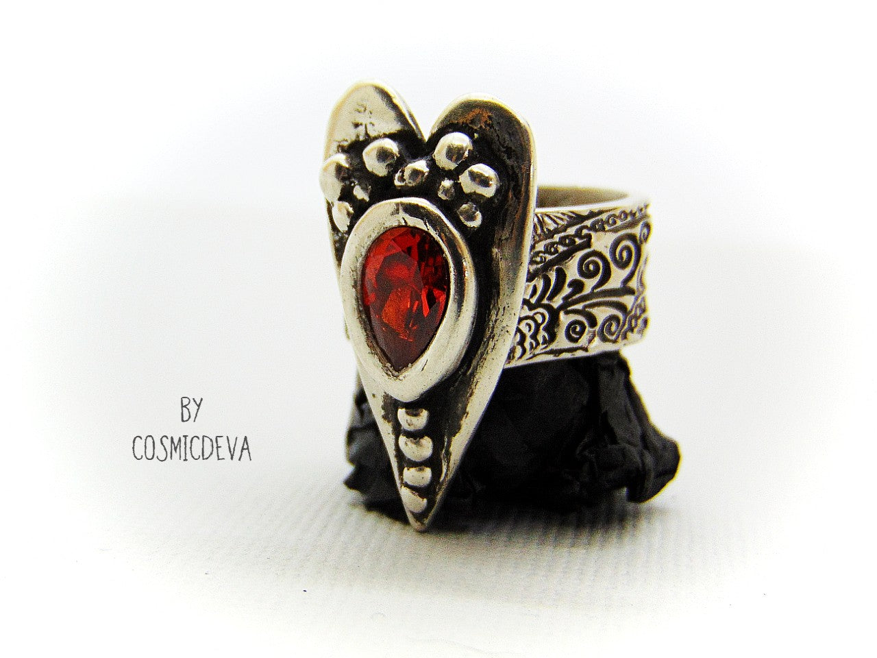 Sterling Silver Heart Ring Red Fire Opal Wide Band US 7. 1/4 Ring, The heart is a symbol of love between two souls. This handcrafted wide ring shank sterling silver ring with floral texture featuring a large heart and 6 x 9 mm pear shaped red fire opal Cubic Zirconia gemstone . This Ring is made of pure .950 sterling silver and hallmarked as it. - CosmicDeva
