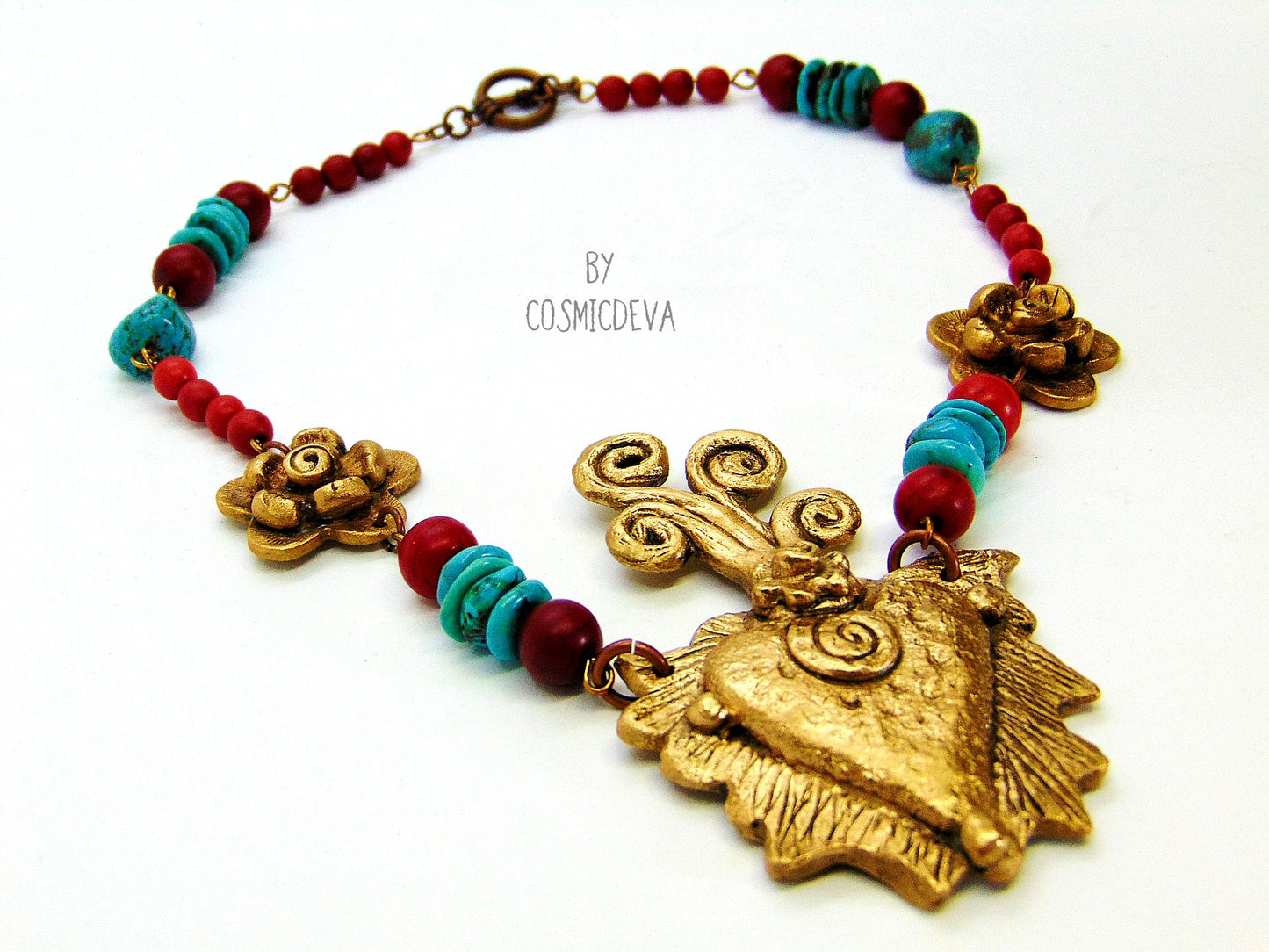 Gold Bronze Milagro Heart Sacred Heart Necklace Set. Stunning bold one of a kind hand sculptured solid golden bronze milagro heart and flower necklace set with natural turquoise, red howlite gemstone beads was kiln fired in my studio with pure Bronze from Bronze Metal Clay. This necklace comes with a matching pair of ear rings - CosmicDeva