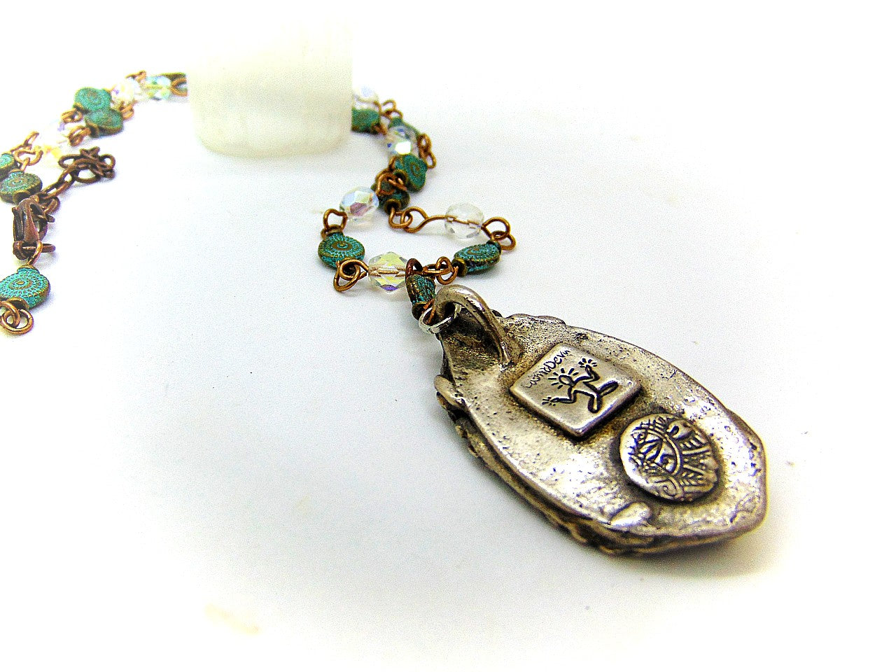 Be inspired with this unique, handmade Goddess Silver Bronze Necklace with a Blue Kyanite gemstone. Its one-of-a-kind design will bring beauty and enchantment to your life! A tiny fire opal adorns the goddess' third eye for an added spark of color and power. Crafted with love, it will be your cherished companion for many years.