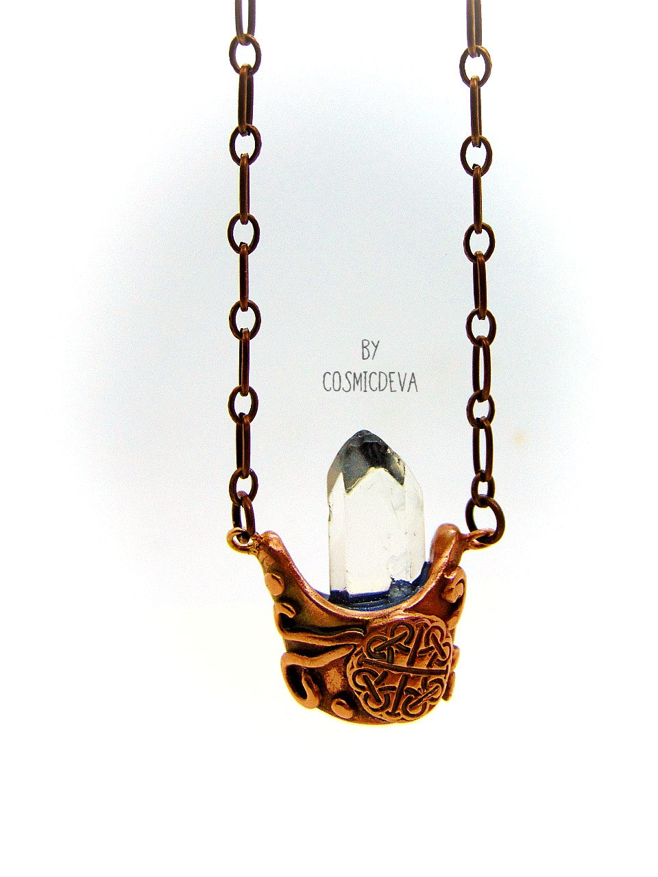 Adorable Wiccan Celtic style solid copper cauldron necklace with a clear Chrystal quartz point in the center. This witchy🧙♀️ cauldron pendant is completely hand formed from solid copper, kiln fired and polished with microcrystalline wax (Renaissance wax)