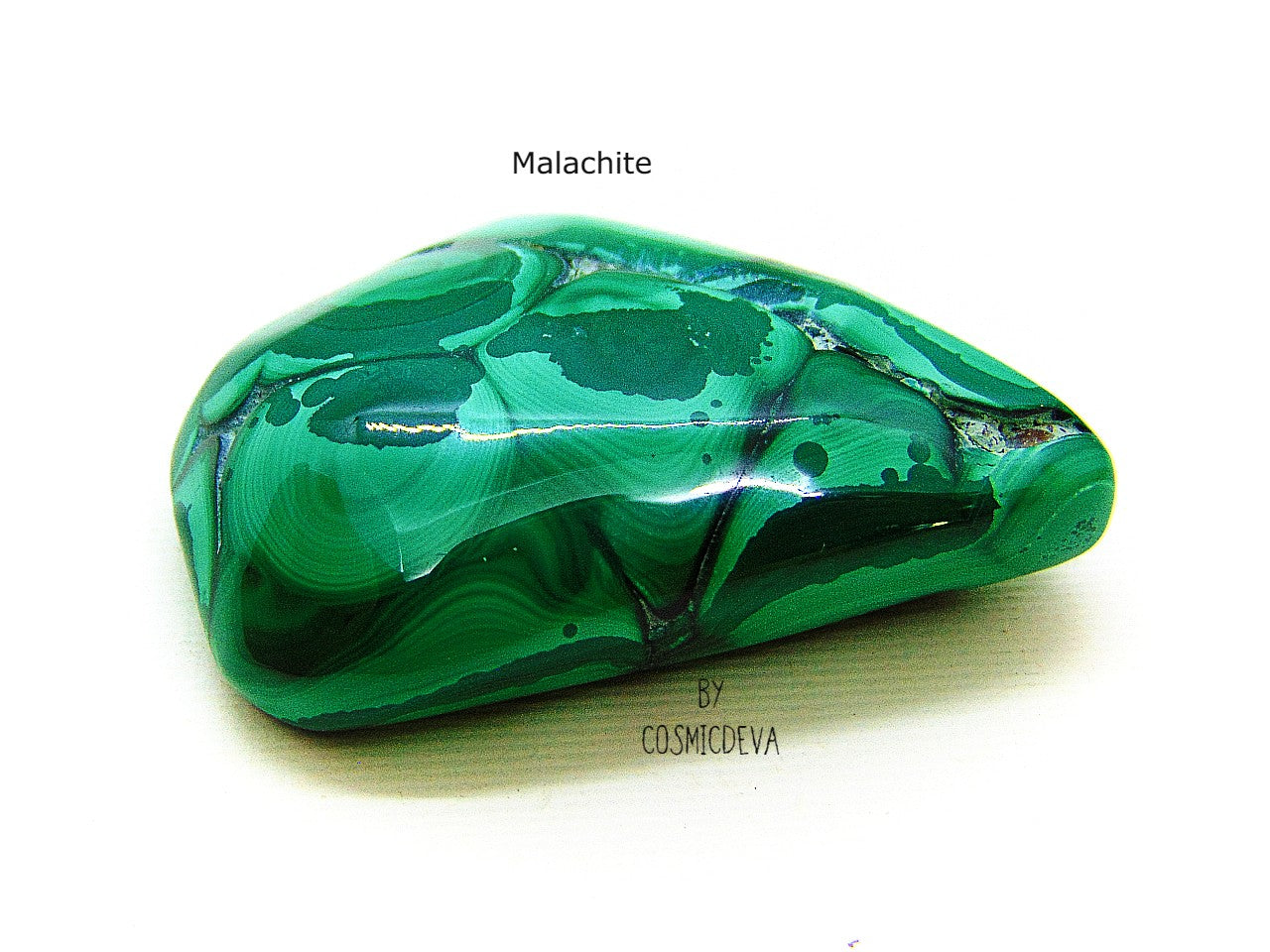 Outstanding and beautiful high quality polished botryoidal green malachite gemstone cabochon. Malachite is a copper ore mineral and has the reputation to protect against the evil eye, witchcraft and evil spirits. This beautiful malachite stone would be a great addition to you Chrystal collection, Chrystal healing or even for jewelry making.