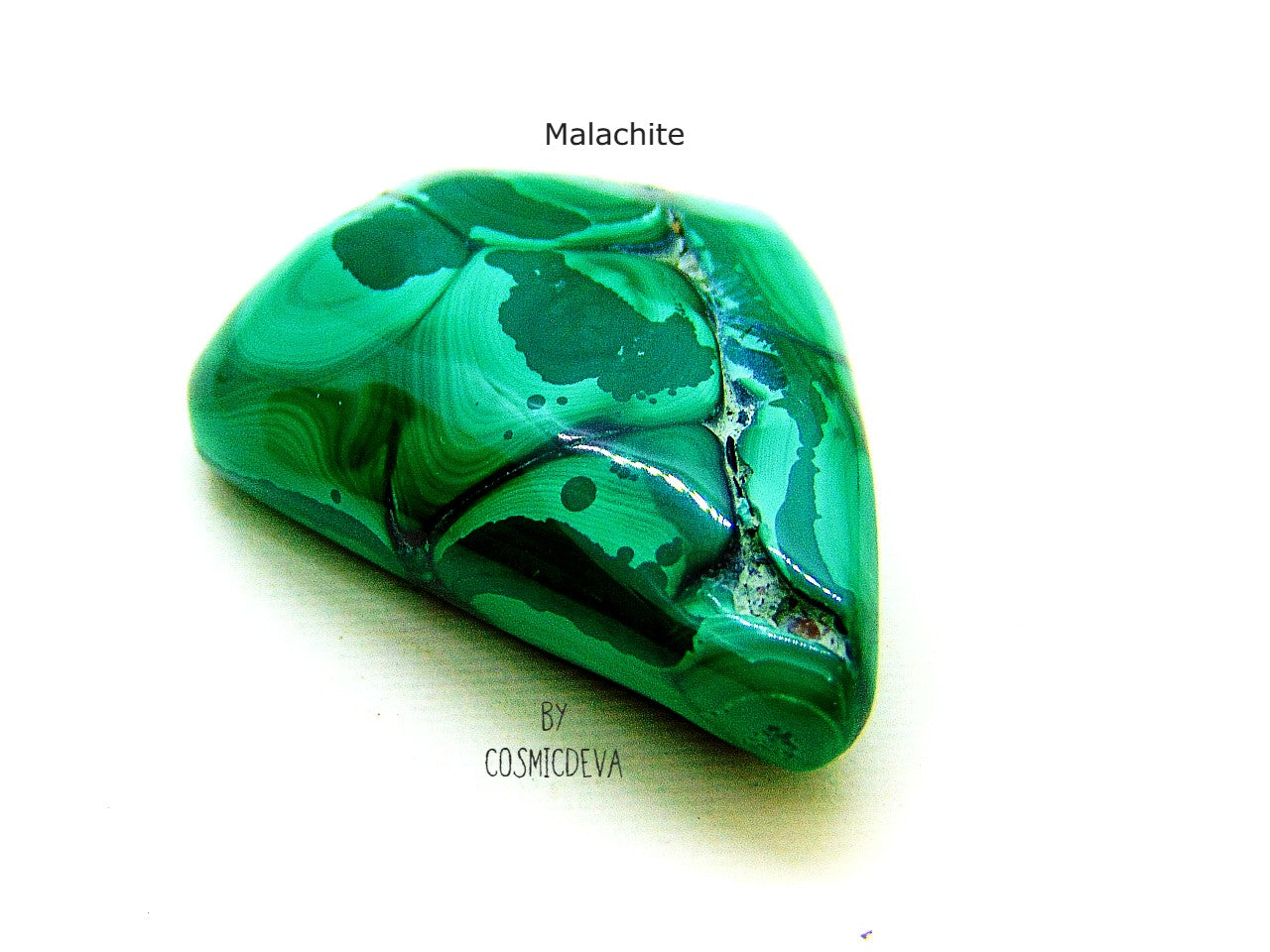 Outstanding and beautiful high quality polished botryoidal green malachite gemstone cabochon. Malachite is a copper ore mineral and has the reputation to protect against the evil eye, witchcraft and evil spirits. This beautiful malachite stone would be a great addition to you Chrystal collection, Chrystal healing or even for jewelry making.