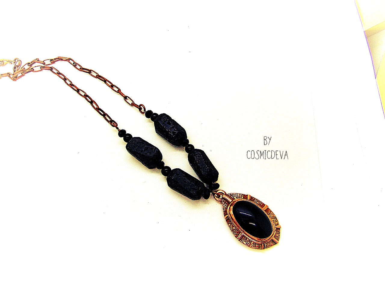 Beautiful rustic solid copper statement necklace with large and very dark black rainbow obsidian gemstone bezel setting as a focal point. The pendant was completely hand formed from solid copper. The statement necklace is made of chunky natural black lava stones with a 12.6mm copper draw cable chain. It has a nice texture and was annealed and polished with microcrystalline wax (Renaissance wax)