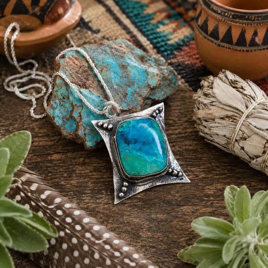 One-of-a-kind Chrysocolla sterling silver necklace featuring a 36ct blue-green Peruvian gemstone, oxidized silver pendant and 18" silver chain.