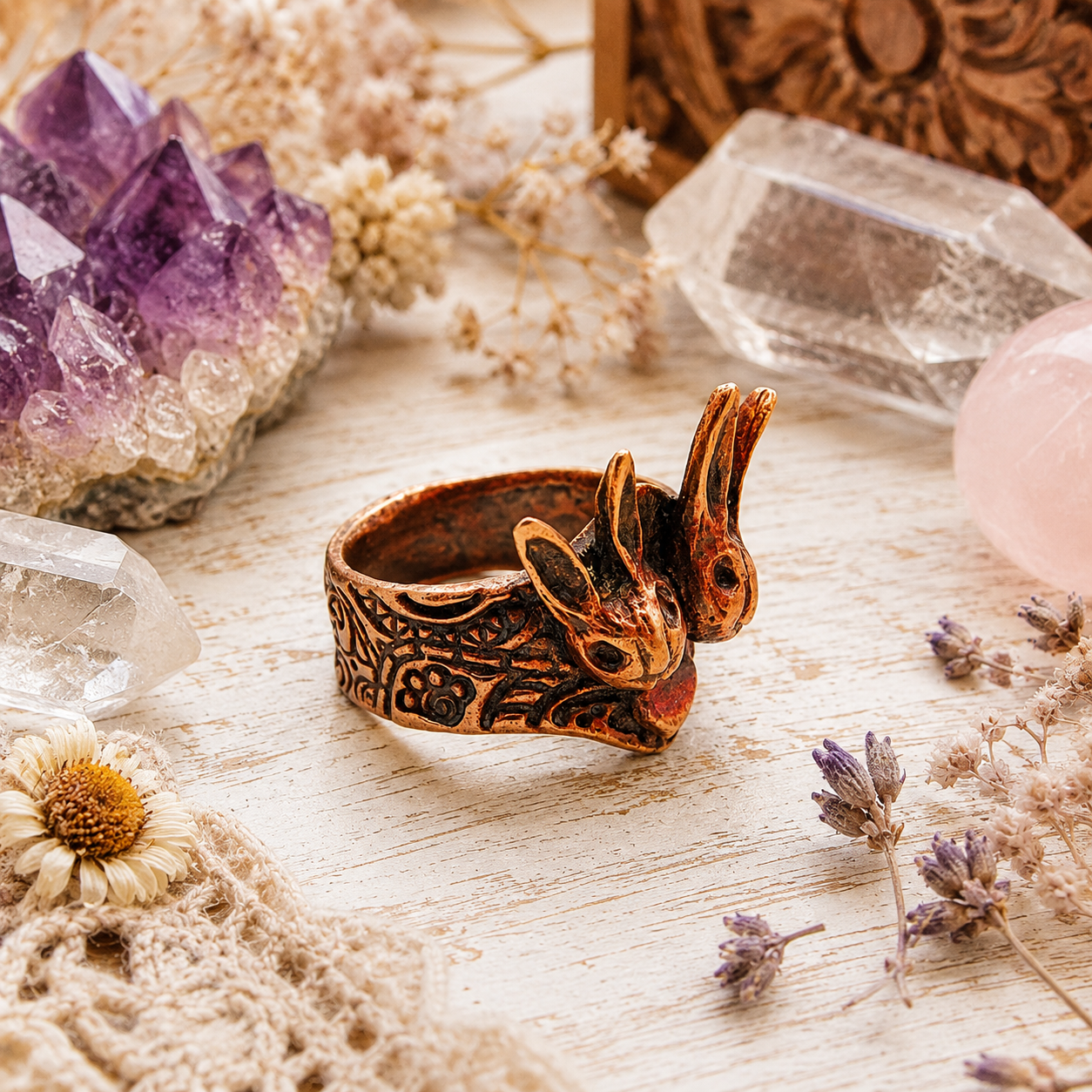 One-of-a-kind handmade copper bunny ring featuring two sculpted rabbits and heart details. Rustic boho rabbit jewelry, US size 7.5, made in the USA. By Cosmicdeva 