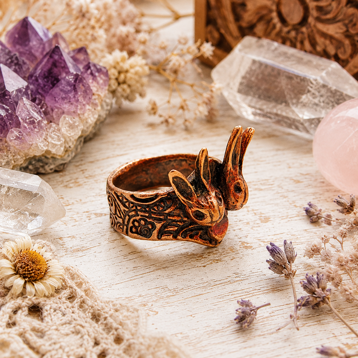 One-of-a-kind handmade copper bunny ring featuring two sculpted rabbits and heart details. Rustic boho rabbit jewelry, US size 7.5, made in the USA. By Cosmicdeva 