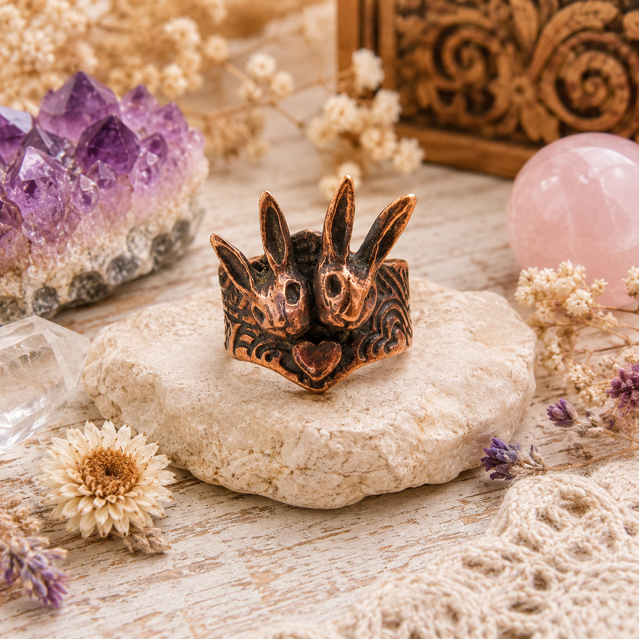 One-of-a-kind handmade copper bunny ring featuring two sculpted rabbits and heart details. Rustic boho rabbit jewelry, US size 7.5, made in the USA. By Cosmicdeva 