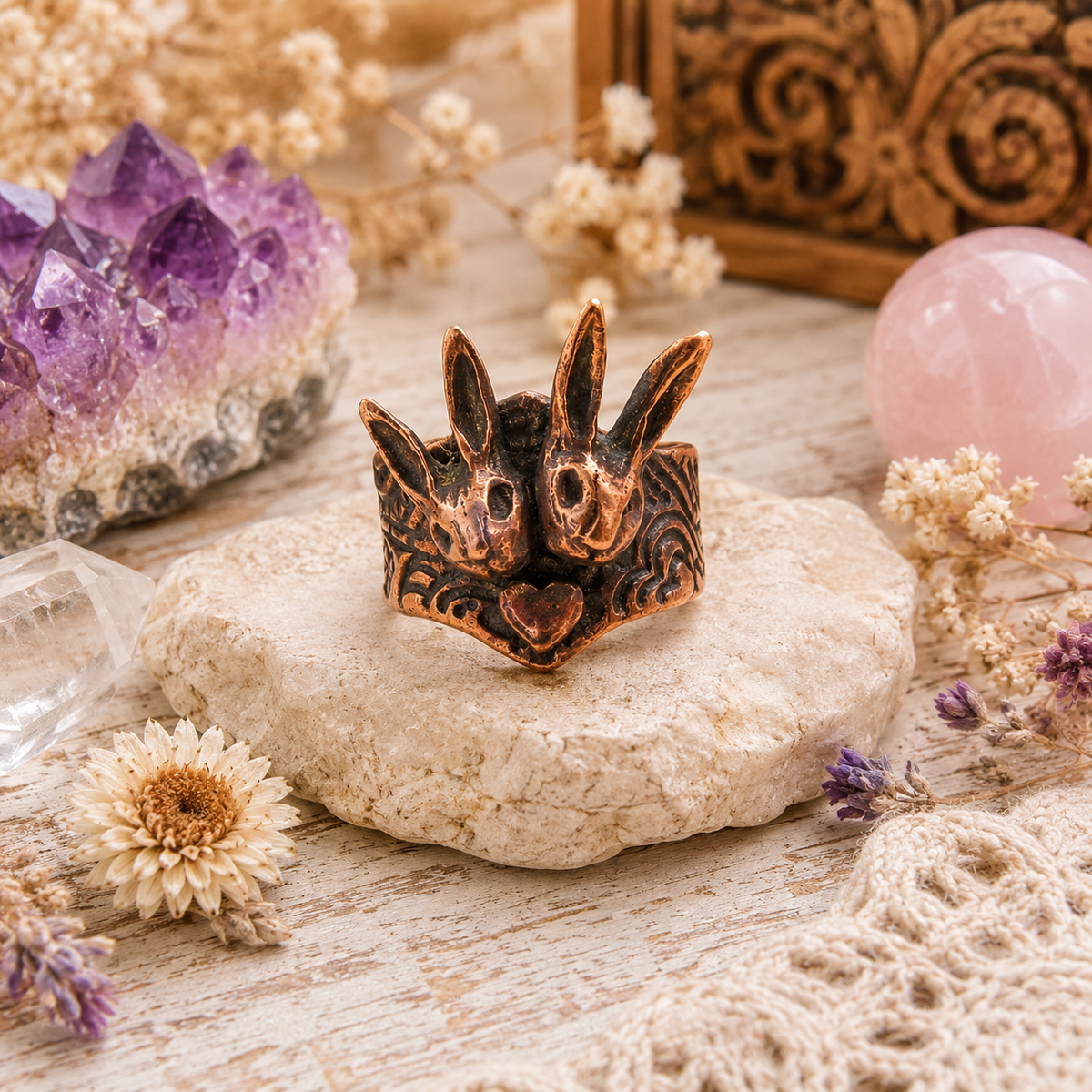 One-of-a-kind handmade copper bunny ring featuring two sculpted rabbits and heart details. Rustic boho rabbit jewelry, US size 7.5, made in the USA. By Cosmicdeva 