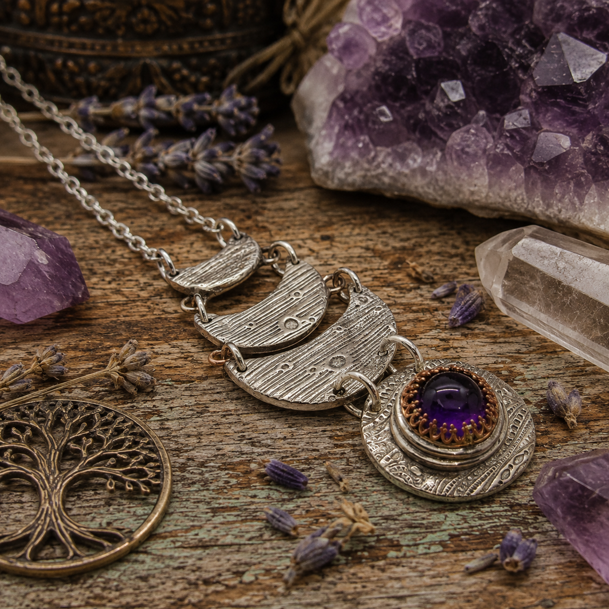 Handmade amethyst moon phase necklace with natural purple amethyst and silver bronze crescent moons. Unique celestial boho jewelry handmade in the USA. By Cosmicdeva 
