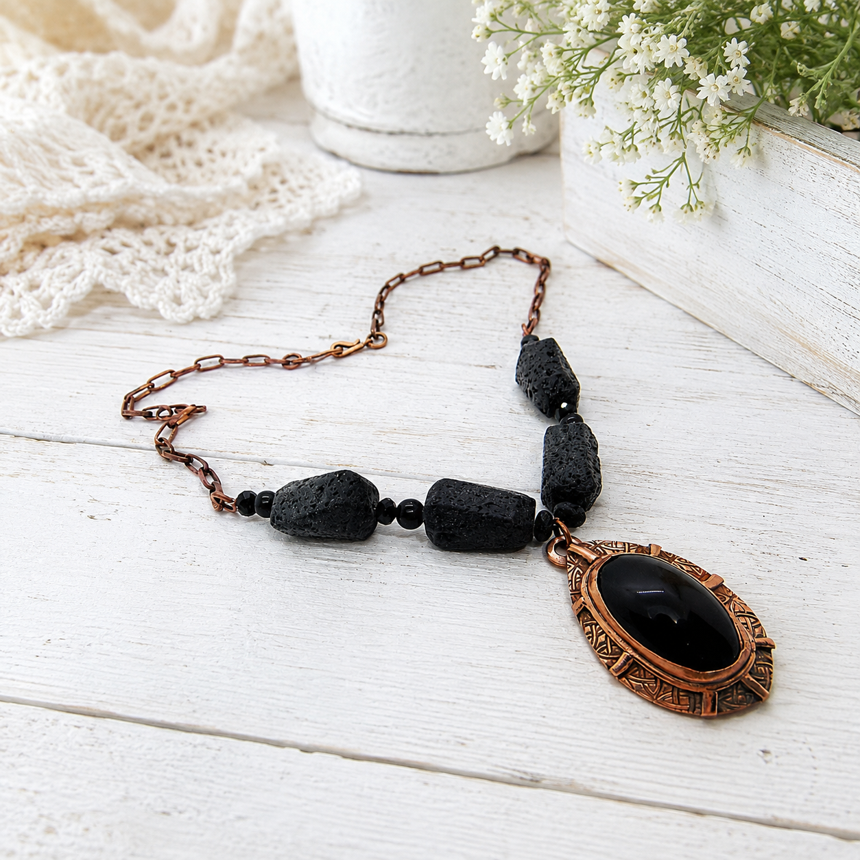 Handmade Rainbow Obsidian necklace with black lava stone beads and solid copper chain. Unique statement jewelry and essential oil diffuser necklace.
