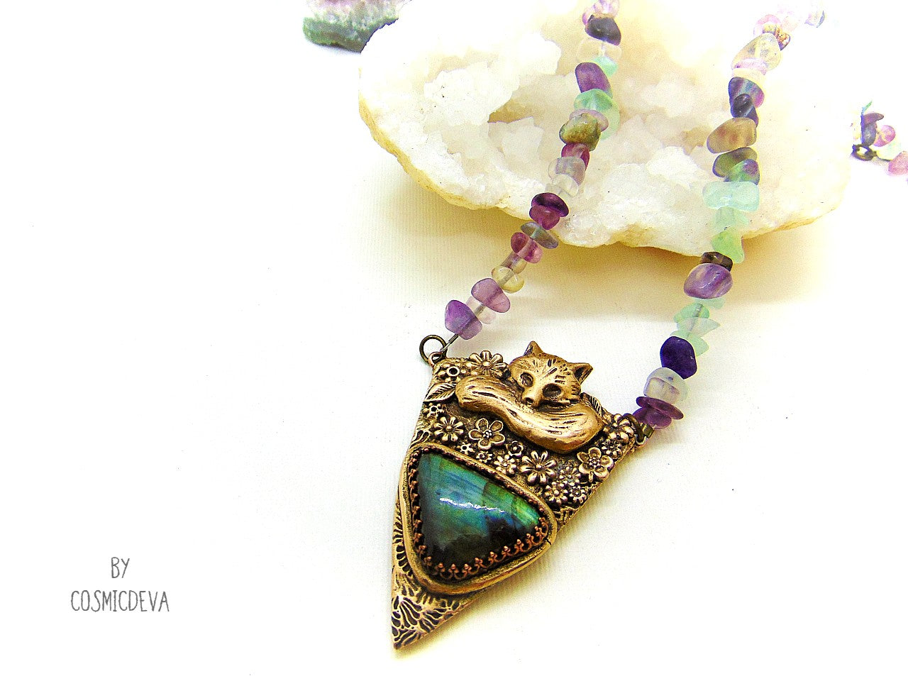 Cute one of a kind complete handcrafted and kiln fired lovely sleeping fox in a flower field gold bronze pendant with a labradorite gemstone in a bezel setting. This animal totem pendant suspends from a handmade adjustable fluorite nuggets necklace.