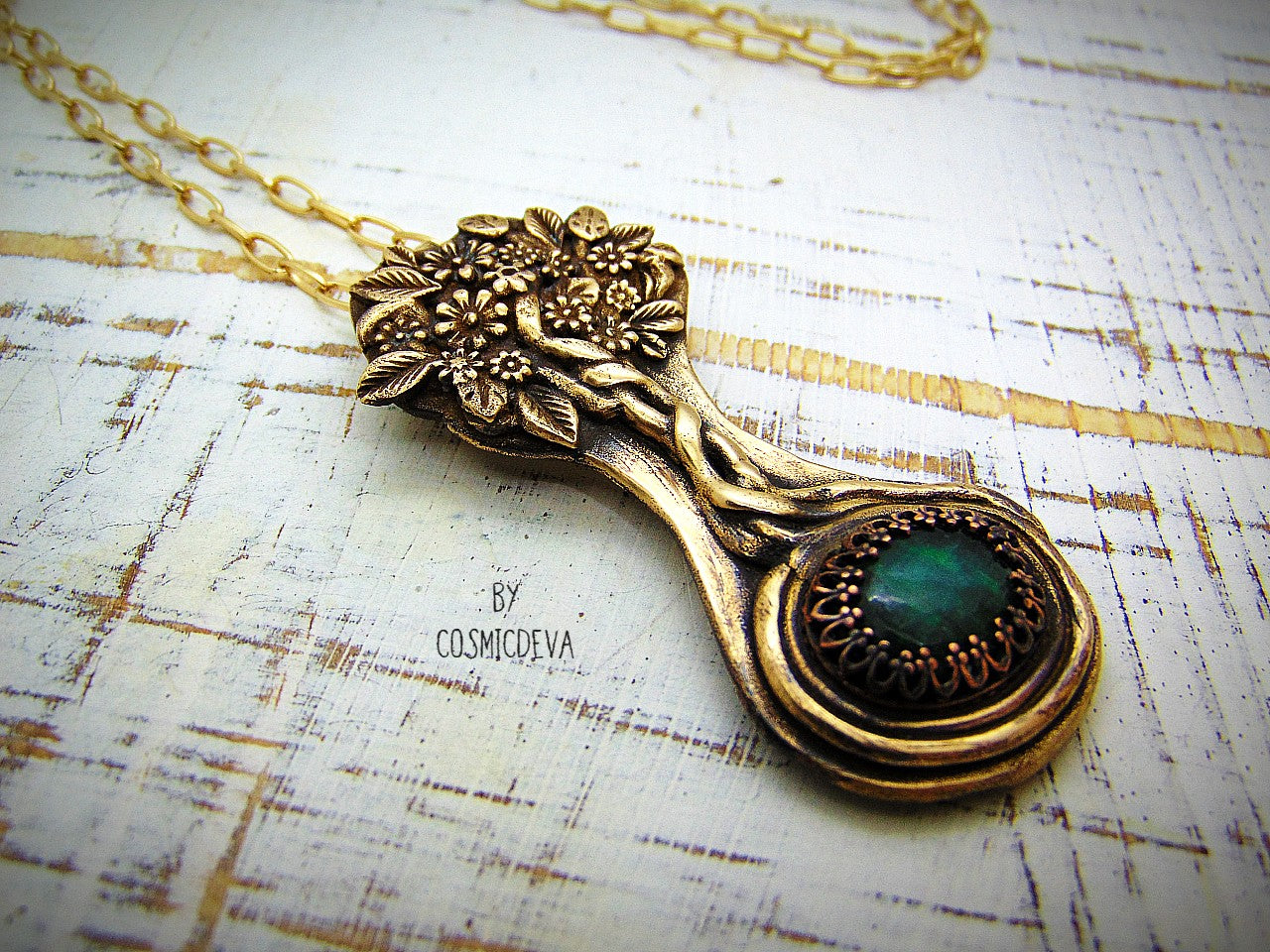 Express your love of life and nature with this intricately-crafted Tree of Life pendant necklace. Handcrafted from solid bronze with a beautiful emerald stone at its root, this unique piece of jewelry celebrates togetherness, growth, and individuality. Give yourself or a loved one the enduring gift of its timeless symbolism.