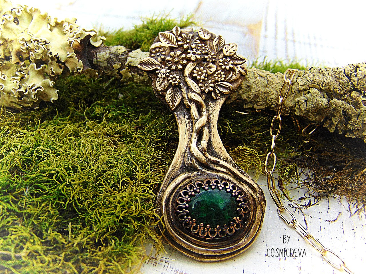 Express your love of life and nature with this intricately-crafted Tree of Life pendant necklace. Handcrafted from solid bronze with a beautiful emerald stone at its root, this unique piece of jewelry celebrates togetherness, growth, and individuality. Give yourself or a loved one the enduring gift of its timeless symbolism.