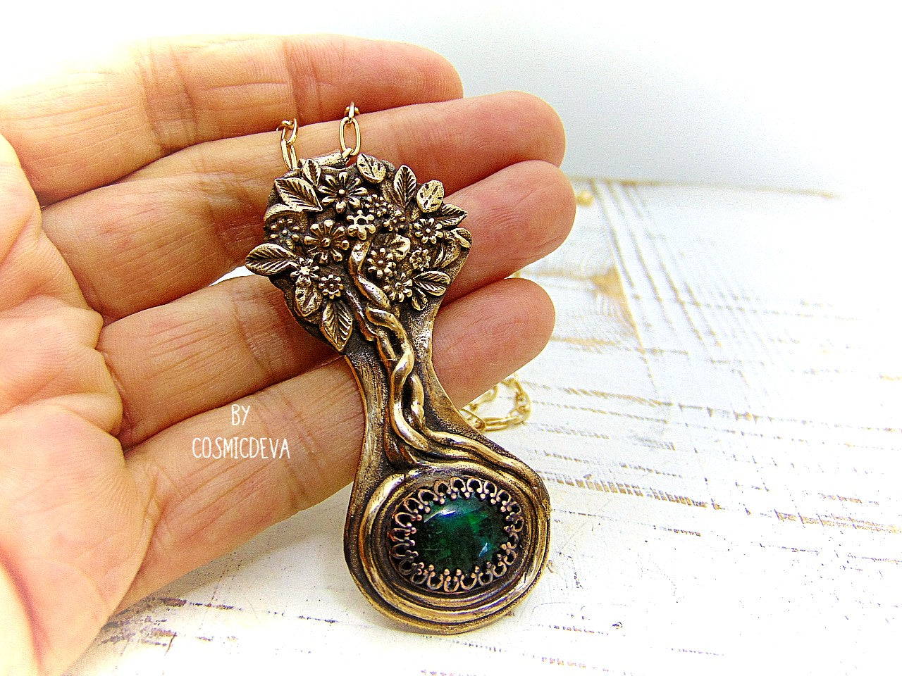 Express your love of life and nature with this intricately-crafted Tree of Life pendant necklace. Handcrafted from solid bronze with a beautiful emerald stone at its root, this unique piece of jewelry celebrates togetherness, growth, and individuality. Give yourself or a loved one the enduring gift of its timeless symbolism.