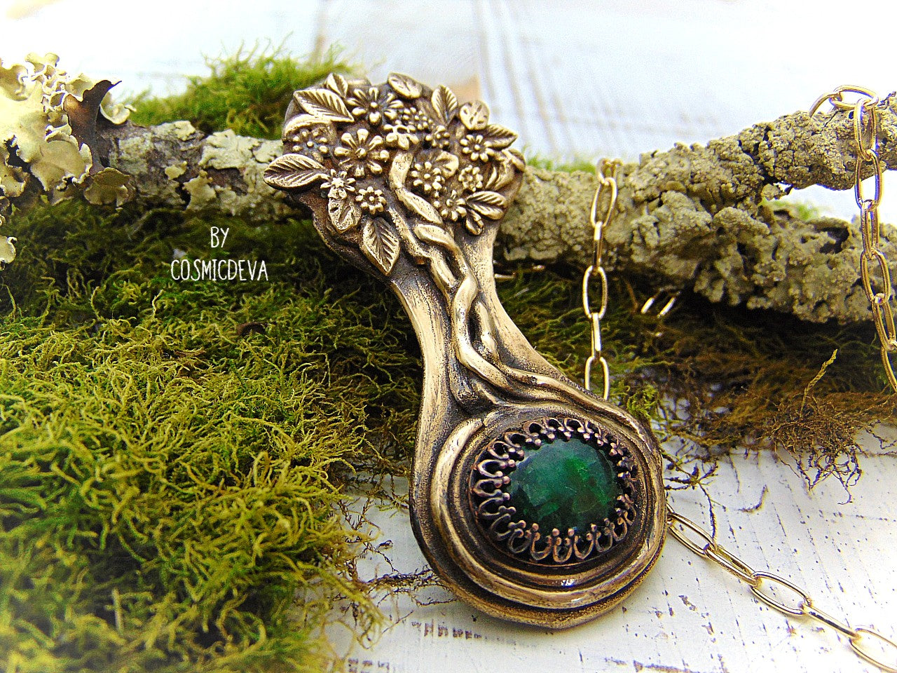 Express your love of life and nature with this intricately-crafted Tree of Life pendant necklace. Handcrafted from solid bronze with a beautiful emerald stone at its root, this unique piece of jewelry celebrates togetherness, growth, and individuality. Give yourself or a loved one the enduring gift of its timeless symbolism.