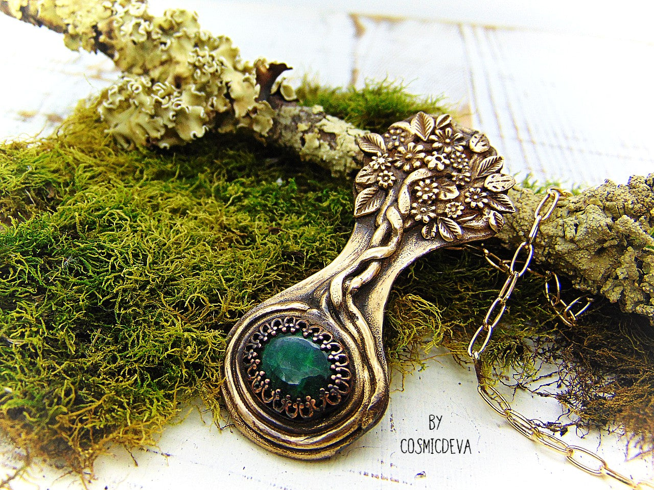 Express your love of life and nature with this intricately-crafted Tree of Life pendant necklace. Handcrafted from solid bronze with a beautiful emerald stone at its root, this unique piece of jewelry celebrates togetherness, growth, and individuality. Give yourself or a loved one the enduring gift of its timeless symbolism.