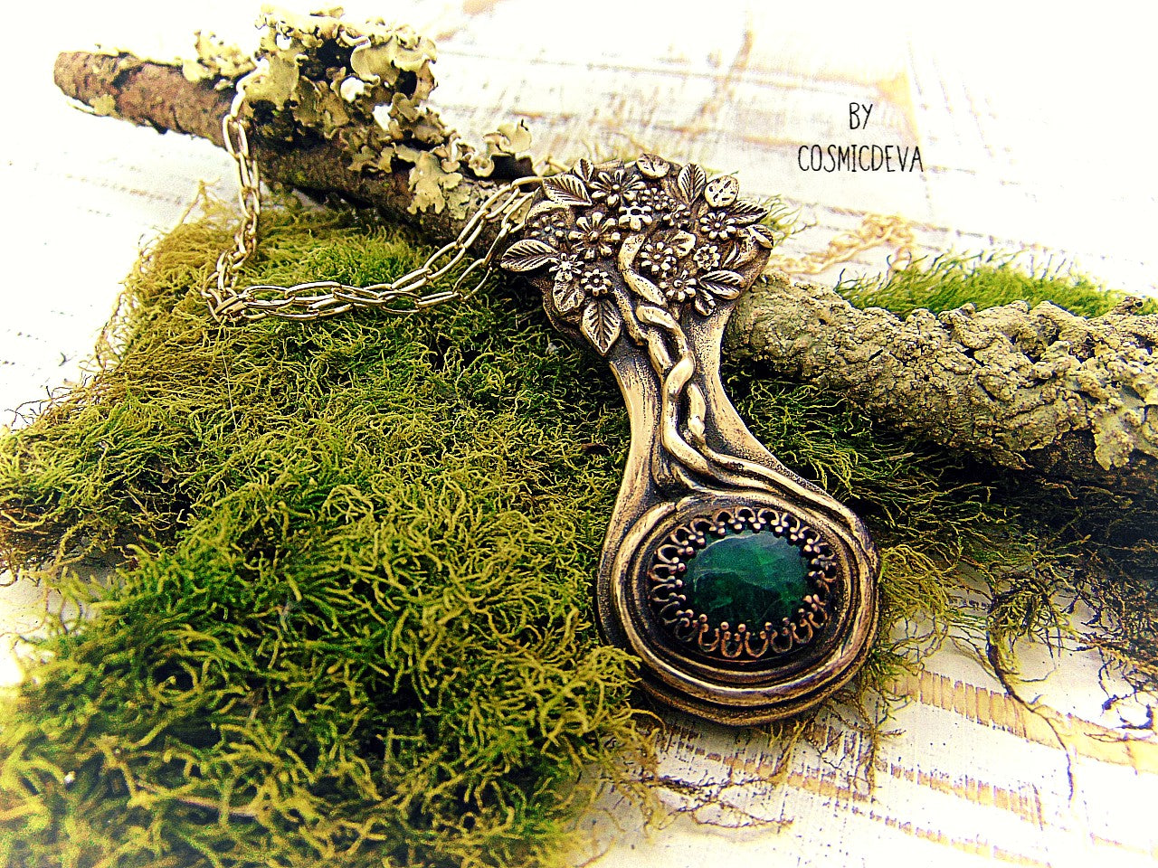 Express your love of life and nature with this intricately-crafted Tree of Life pendant necklace. Handcrafted from solid bronze with a beautiful emerald stone at its root, this unique piece of jewelry celebrates togetherness, growth, and individuality. Give yourself or a loved one the enduring gift of its timeless symbolism.