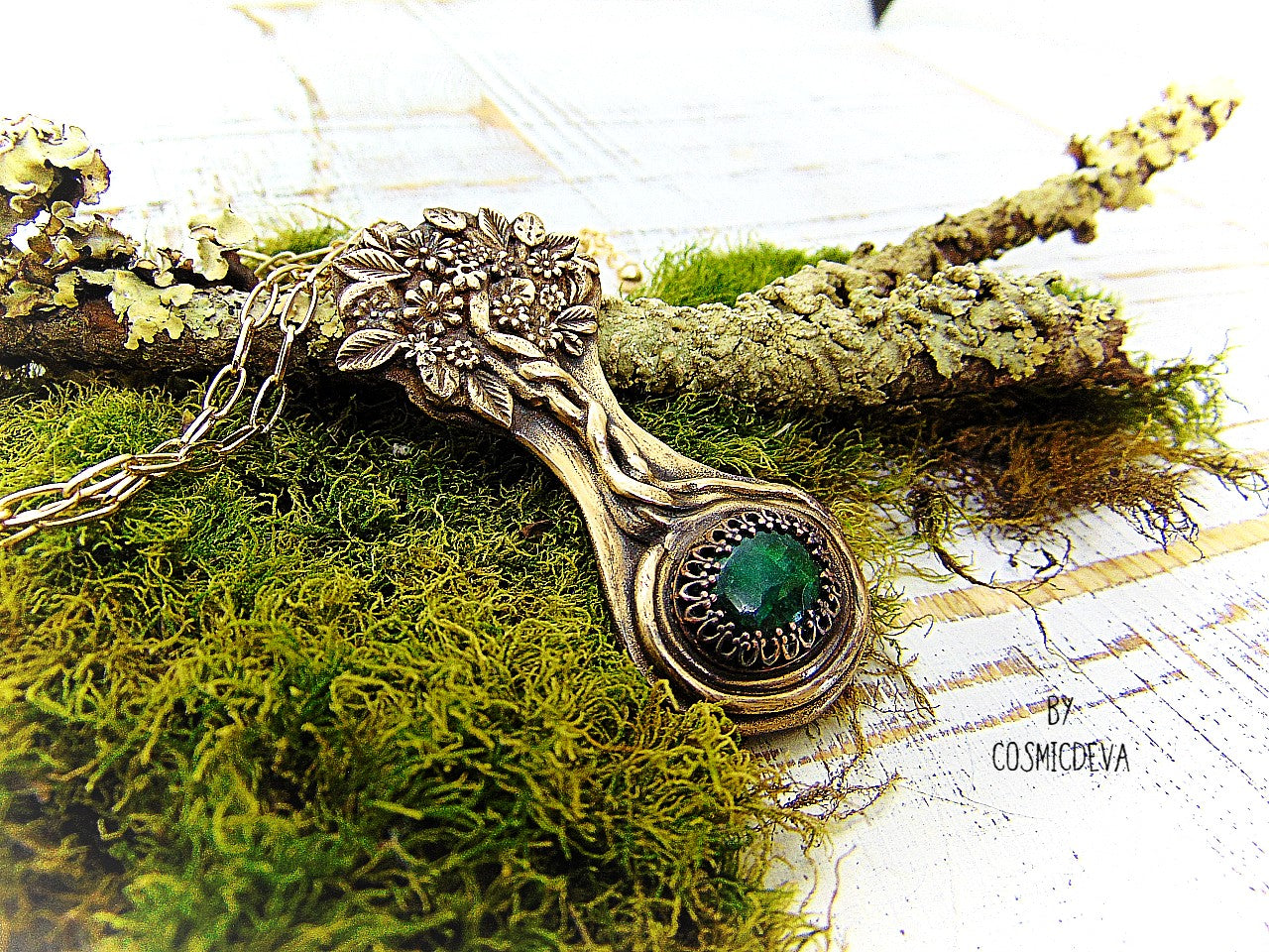 Express your love of life and nature with this intricately-crafted Tree of Life pendant necklace. Handcrafted from solid bronze with a beautiful emerald stone at its root, this unique piece of jewelry celebrates togetherness, growth, and individuality. Give yourself or a loved one the enduring gift of its timeless symbolism.