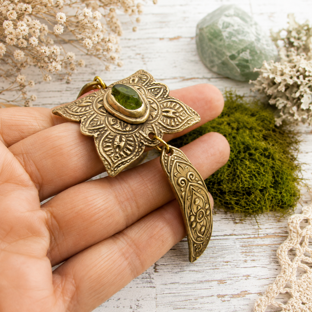 Handmade Elven bronze bracelet with natural green peridot, ornate mandala details and artisan toggle clasp. Unique boho August birthstone jewelry.