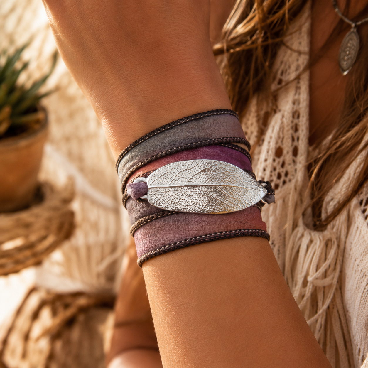 Handmade sage leaf wrap bracelet featuring recycled .999 fine silver and hand-dyed silk ribbon. Unique botanical boho jewelry inspired by nature. by Cosmicdeva 