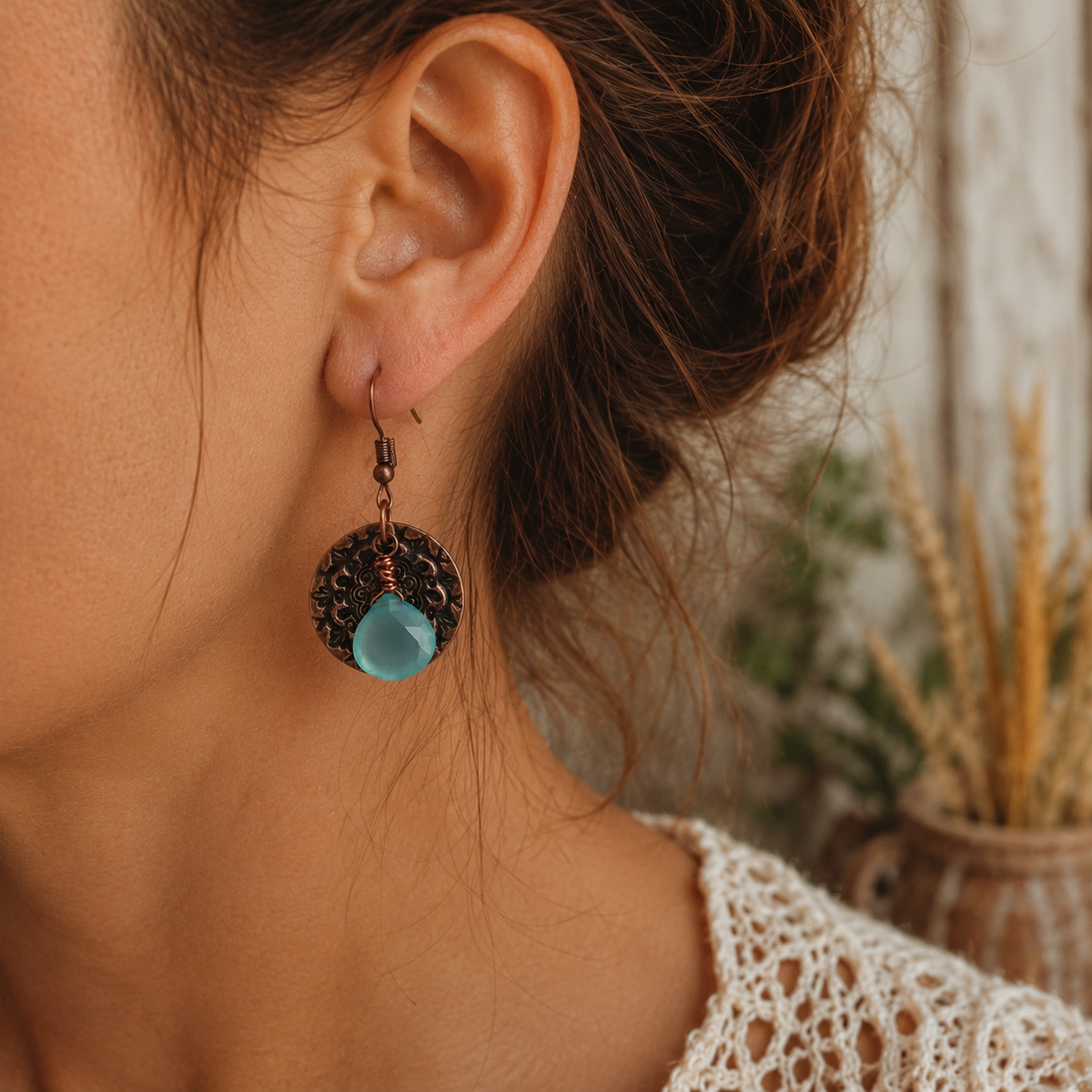 Handmade blue chalcedony earrings with oxidized copper floral mandala discs. Aqua gemstone boho dangle earrings handcrafted in the USA. By Cosmicdeva 