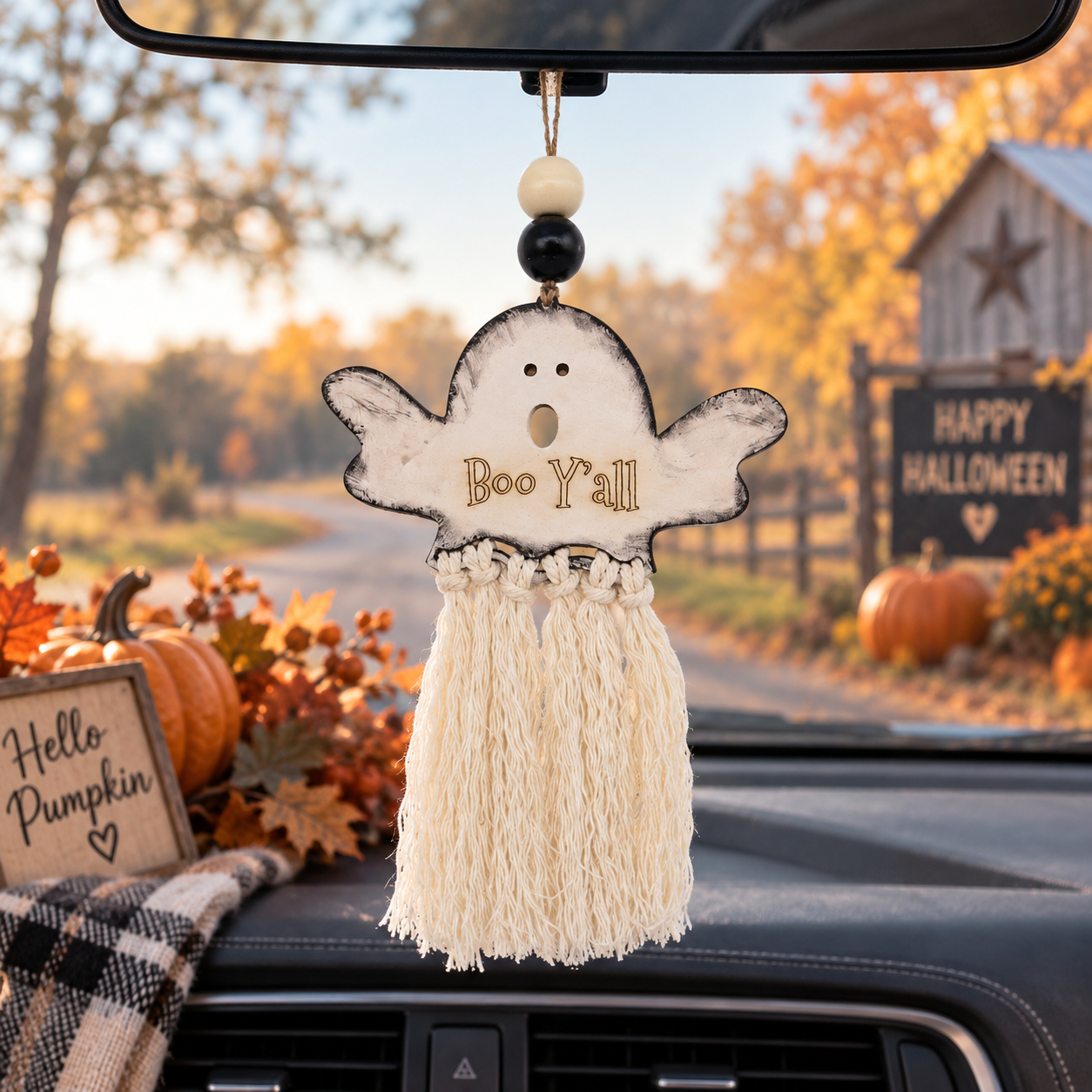 Handmade Halloween ghost car charm with white macramé tassel, wooden beads and double-sided Boo Y’all / No Tricks, just treats engraving. Made By Cosmicdeva 