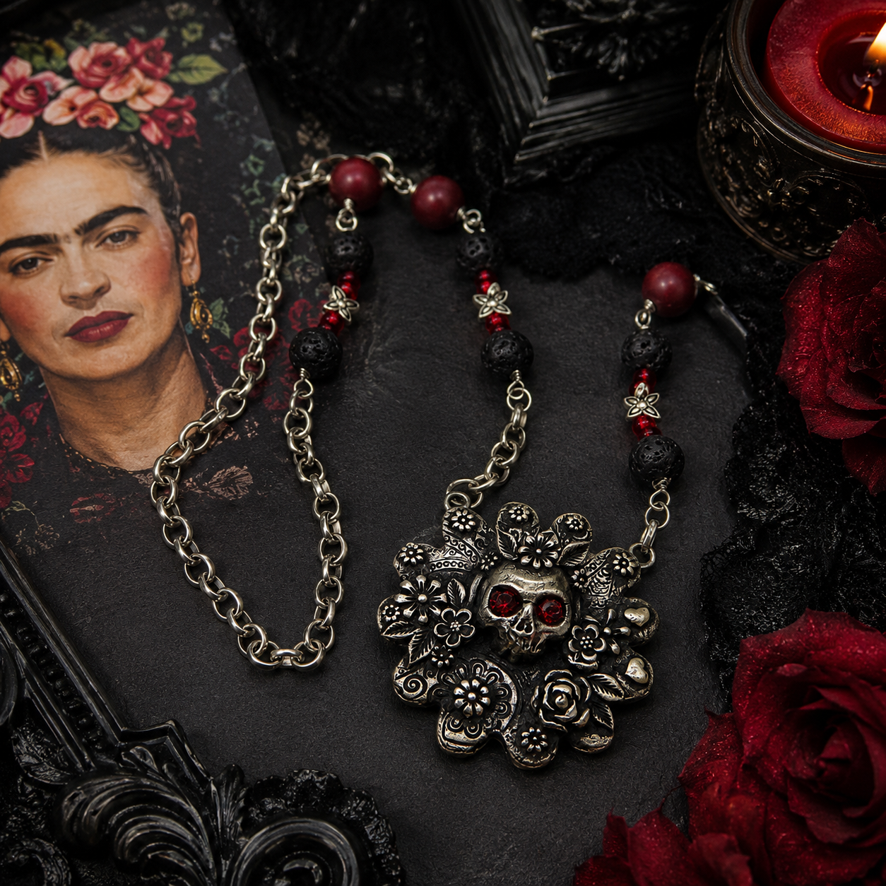 Cherish Mexican folk art with this unique Frida Kahlo sugar skull necklace, featuring a silver bronze floral pendant accented with garnet gemstones, roses, leaves and hearts.