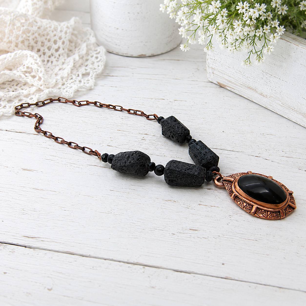 Handmade Rainbow Obsidian necklace with black lava stone beads and solid copper chain. Unique statement jewelry and essential oil diffuser necklace.