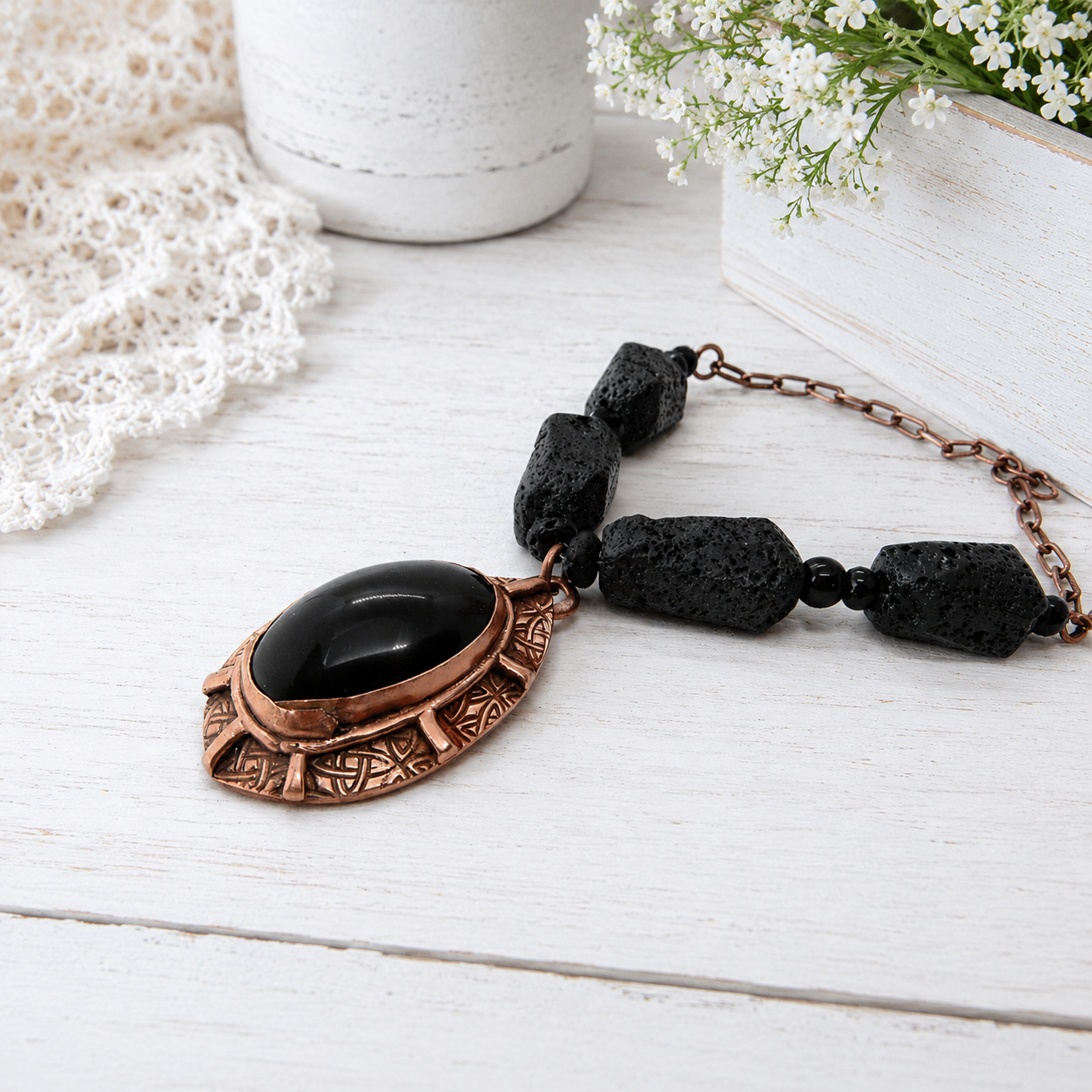 Handmade Rainbow Obsidian necklace with black lava stone beads and solid copper chain. Unique statement jewelry and essential oil diffuser necklace.