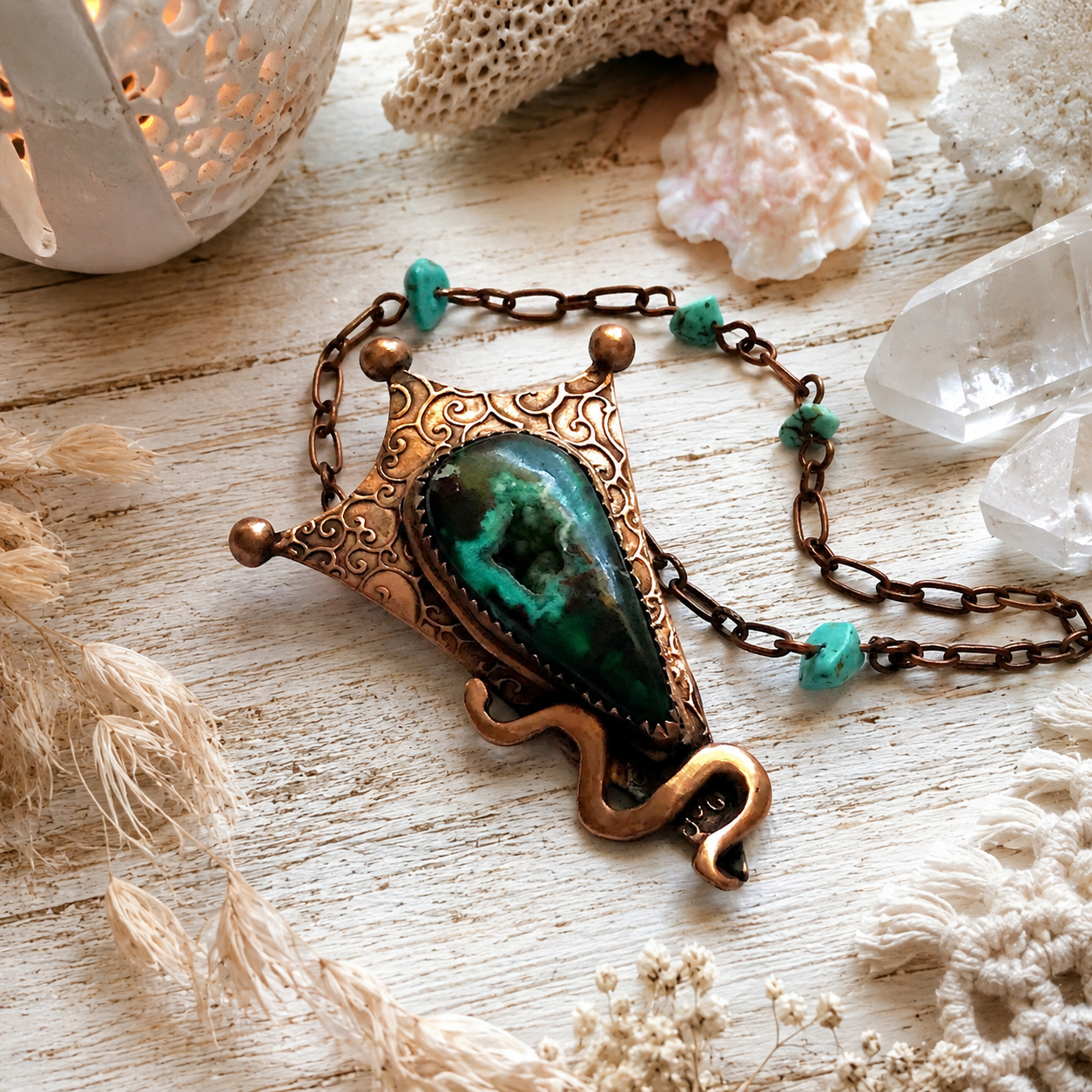 The focal point of this stunning copper pendant necklace is an amazing Chrysocolla (with Malachite and traces of cuprite) which has formed in the center into botryoidal druzy crystals. 
