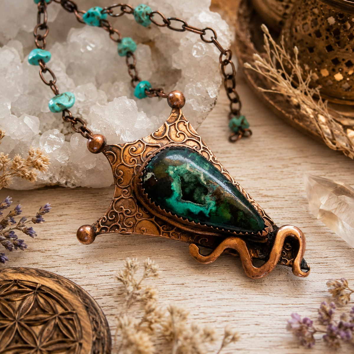 The focal point of this stunning copper pendant necklace is an amazing Chrysocolla (with Malachite and traces of cuprite) which has formed in the center into botryoidal druzy crystals. 
