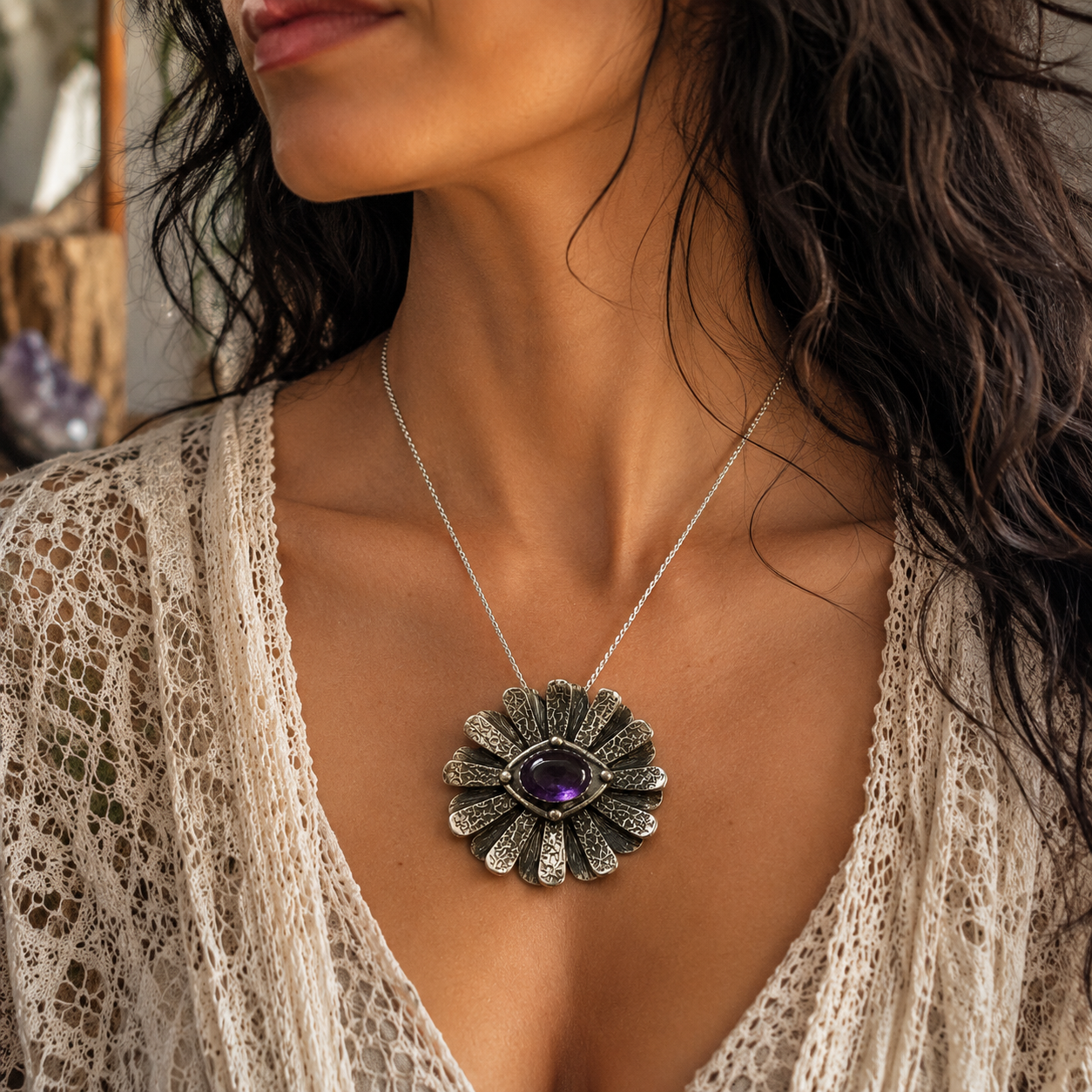 One-of-a-kind handmade natural amethyst necklace featuring a .999 fine silver daisy flower pendant, natural February birthstone and 18-inch chain. Made in USA.