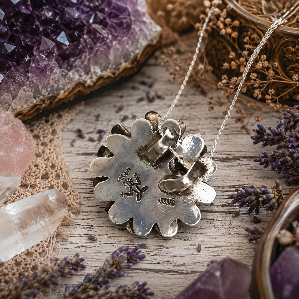 One-of-a-kind handmade natural amethyst necklace featuring a .999 fine silver daisy flower pendant, natural February birthstone and 18-inch chain. Made in USA.
