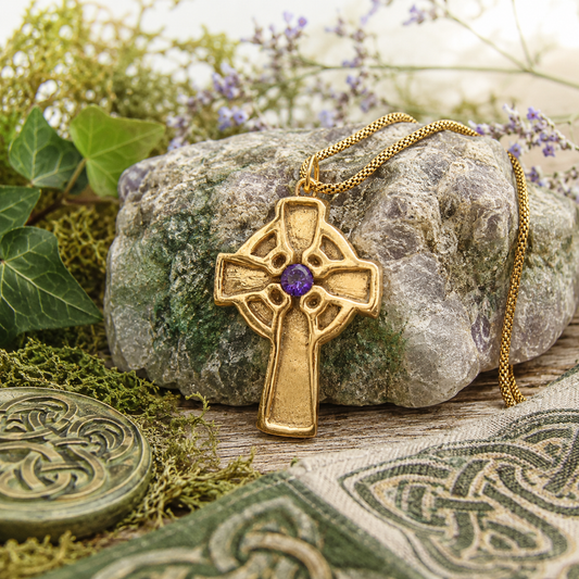 Handmade Celtic Cross necklace in solid golden bronze with purple amethyst CZ and 18K gold-plated chain. Unique Irish Celtic jewelry and faith gift.