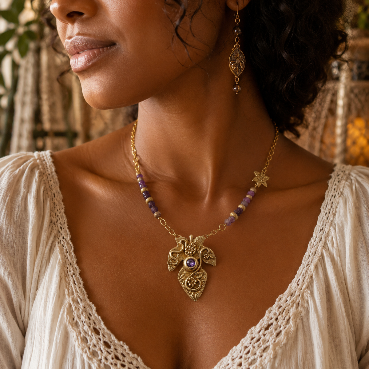 Handcrafted gold bronze fig leaf necklace with natural Lepidolite beads and purple Amethyst CZ. Botanical boho jewelry handmade in the USA. By Cosmicdeva