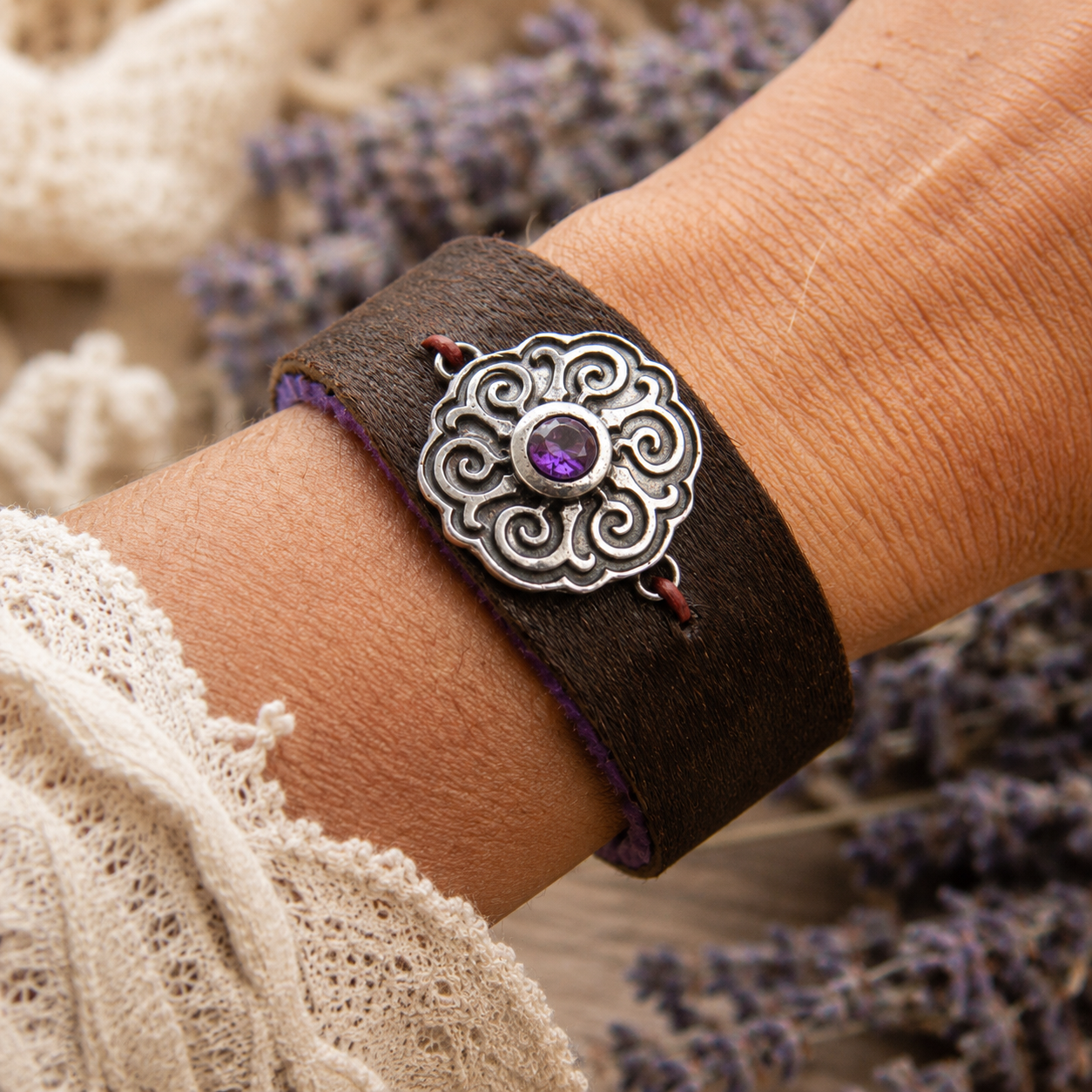 Handmade cowhide leather cuff bracelet with Celtic .950 sterling silver centerpiece and purple amethyst CZ. Unique boho Western artisan jewelry. By Cosmicdeva 