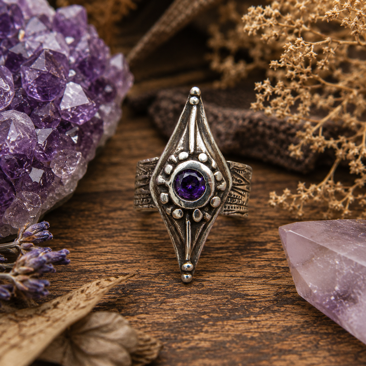 Bohemian amethyst ring handcrafted in .950 sterling silver with a sparkling purple stone, textured wide band and rustic oxidized finish. Unique artisan boho jewelry.by Cosmicdeva 