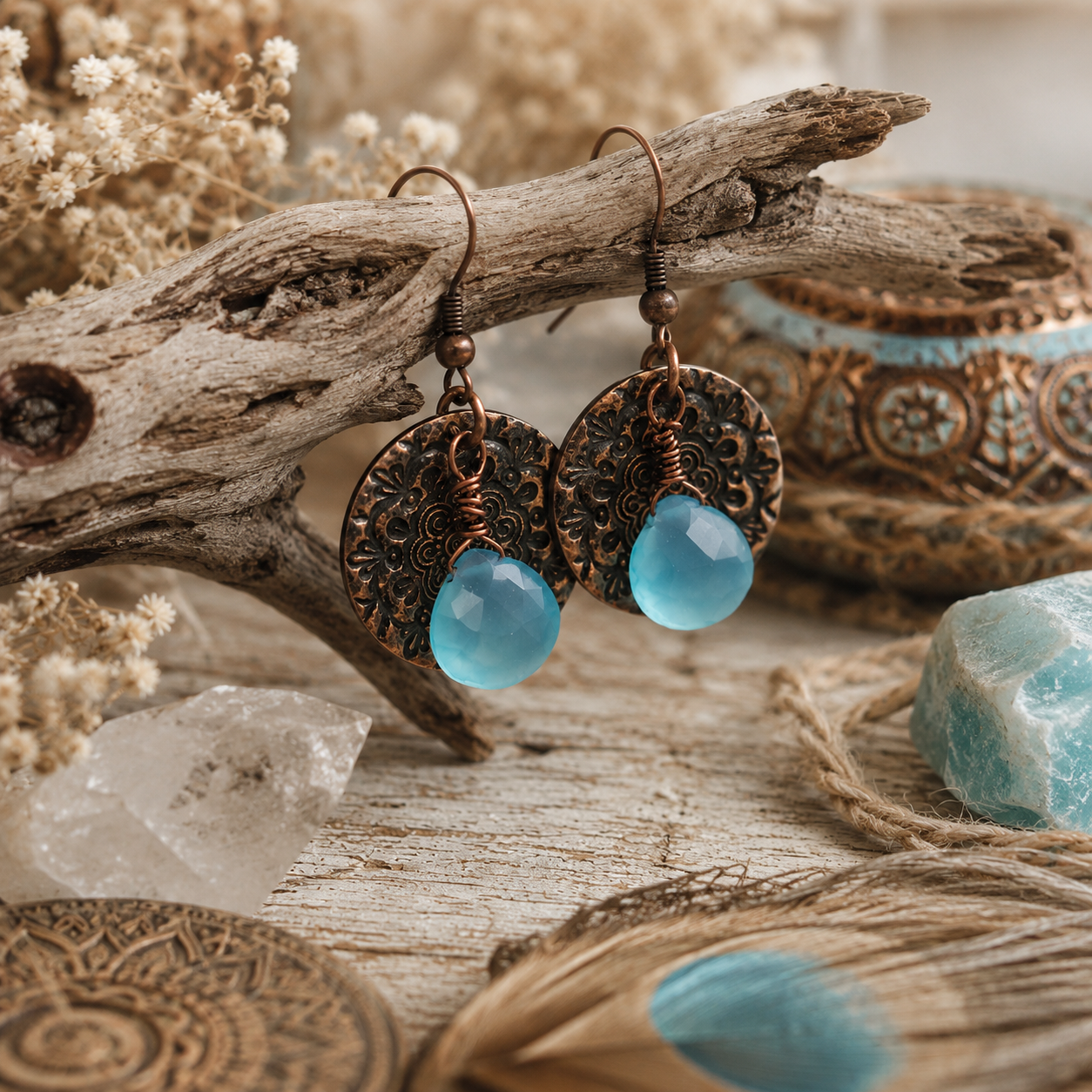 Handmade blue chalcedony earrings with oxidized copper floral mandala discs. Aqua gemstone boho dangle earrings handcrafted in the USA. By Cosmicdeva 