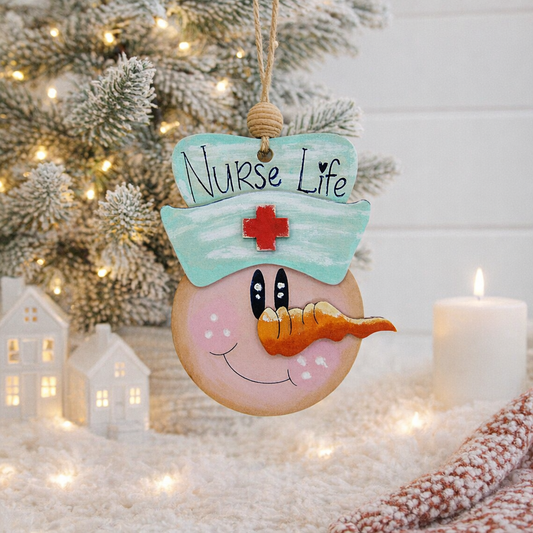 Hand painted Wooden Nurse Snowman Christmas Ornament with layered basswood design and engraved “Nurse Life” lettering. A perfect Christmas gift for nurses, nursing students, and healthcare workers.