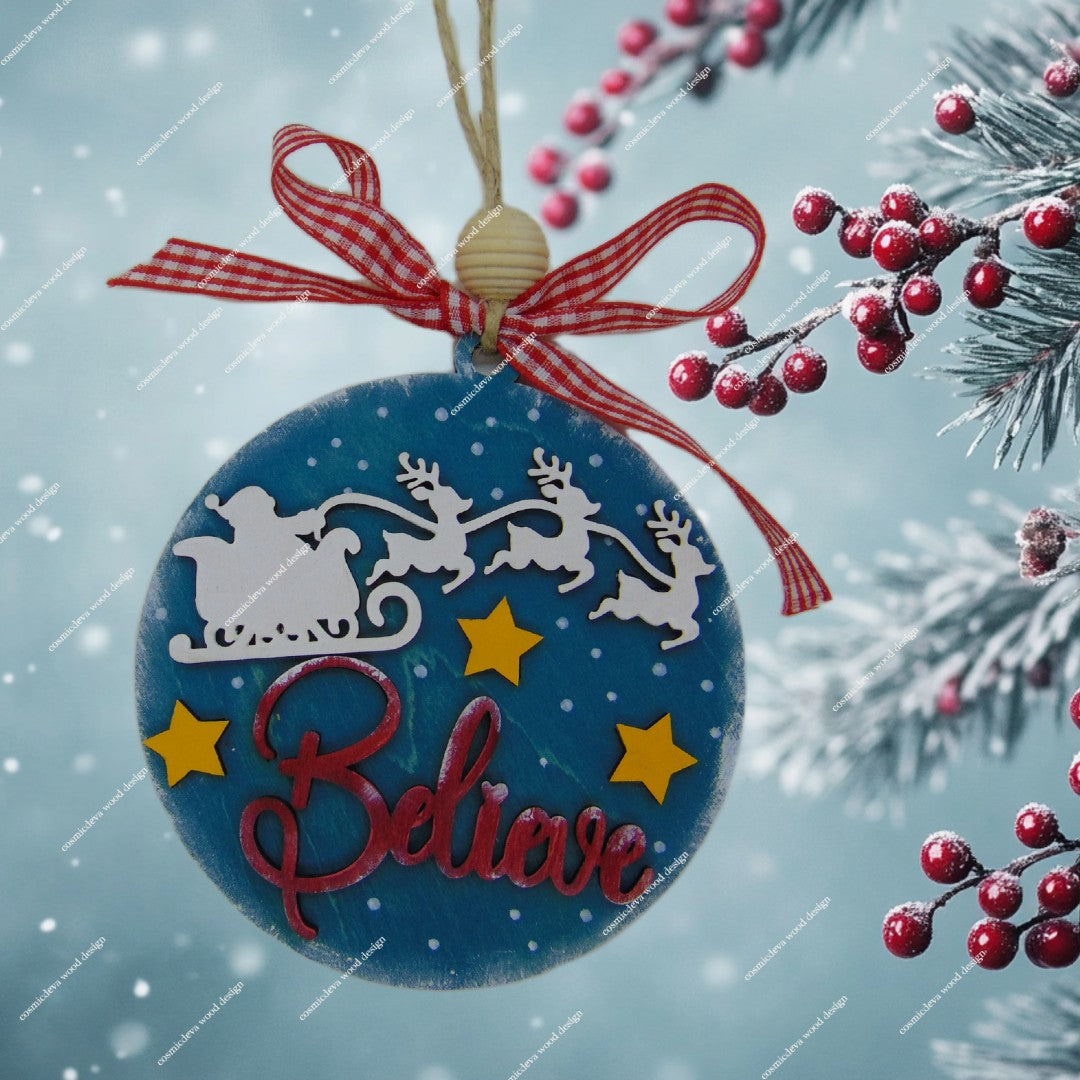 Celebrate the magic with a "Believe" Santa Sleigh wooden ornament. Hand-painted, 3D layered birch wood design with a polished, double-sided finish. Shop unique handmade holiday decor!