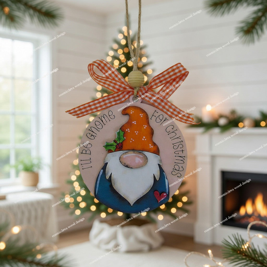 Handmade hand painted gnome Christmas ornament with engraved “I’ll Be Gnome for Christmas” text. Layered Baltic birch wood, rustic jute twine, wood bead, and bow. Cute holiday décor or gift.