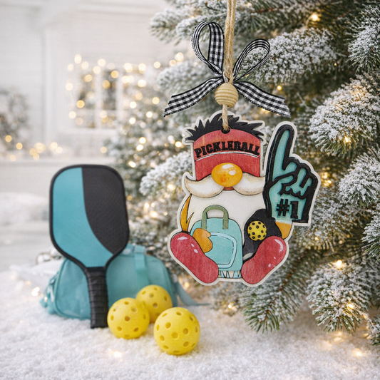 Looking for the perfect pickleball gift? This 3D layered wood Pickleball Gnome Ornament features a "Number 1" pose, hand-painted details, and a rustic bow. Ideal for Christmas trees, tournament prizes, or coach gifts. Durable, artisan-made, and ready to hang!