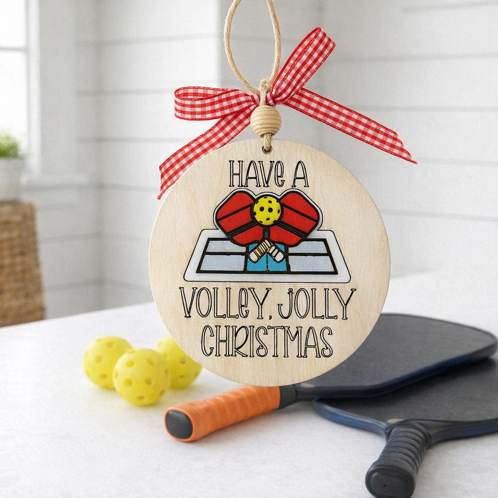 Celebrate the season with our 3D Pickleball Christmas Ornament! Hand-painted wood, layered depth, and "Volley Jolly" engraving. The perfect gift for pickleball lovers.
