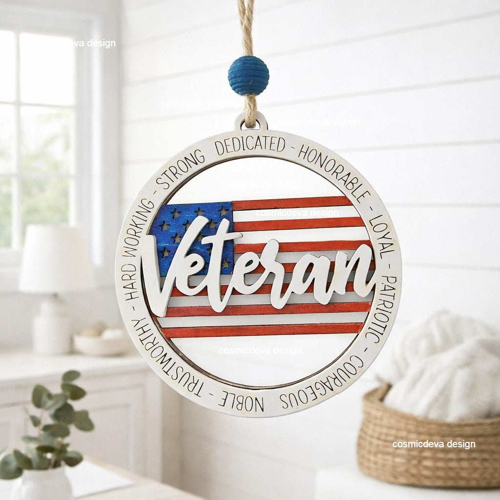Honor a Veteran with this handmade 2 layer wooden ornament featuring a painted American flag, engraved tribute words, and double sided patriotic text. A meaningful military gift for Christmas, holidays, or year round appreciation.