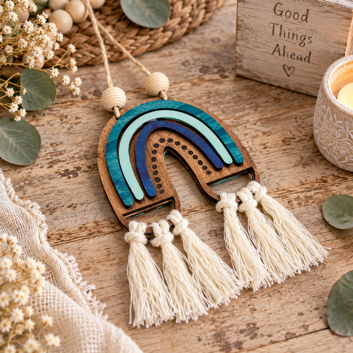 Handmade boho rainbow car charm with layered birch wood, macramé tassels and inspirational back engraving. Choose 3 colors or a DIY kit. Made By Cosmicdeva design
