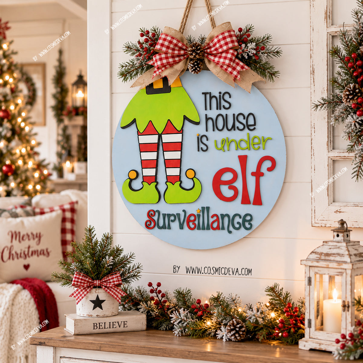 Handmade Elf Christmas door hanger featuring “This House Is Under Elf Surveillance.” Layered 3D wood sign in 12" or 14", hand painted in Alabama. By cosmicdeva