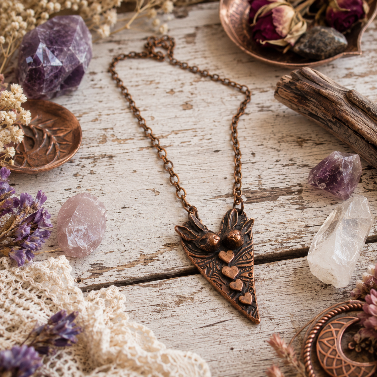 Handmade Bunny Love copper necklace featuring two rabbits and tiny hearts. One-of-a-kind boho rabbit pendant jewelry and romantic gift for her. By Cosmicdeva